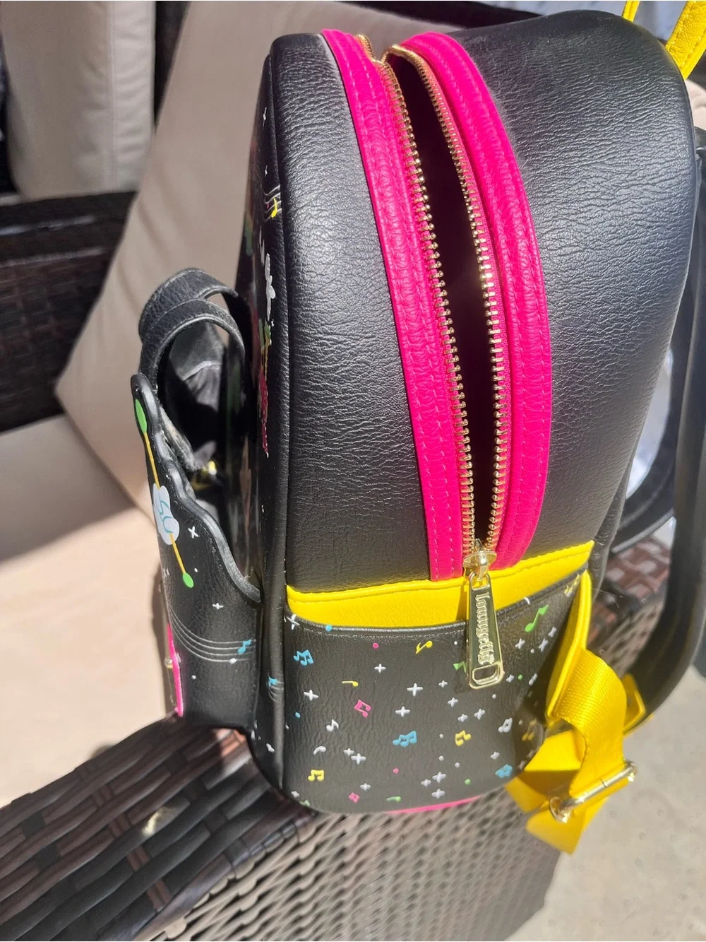 Disney Black Mini Backpack with Yellow Straps and Colorful Mickey Fantasy Print